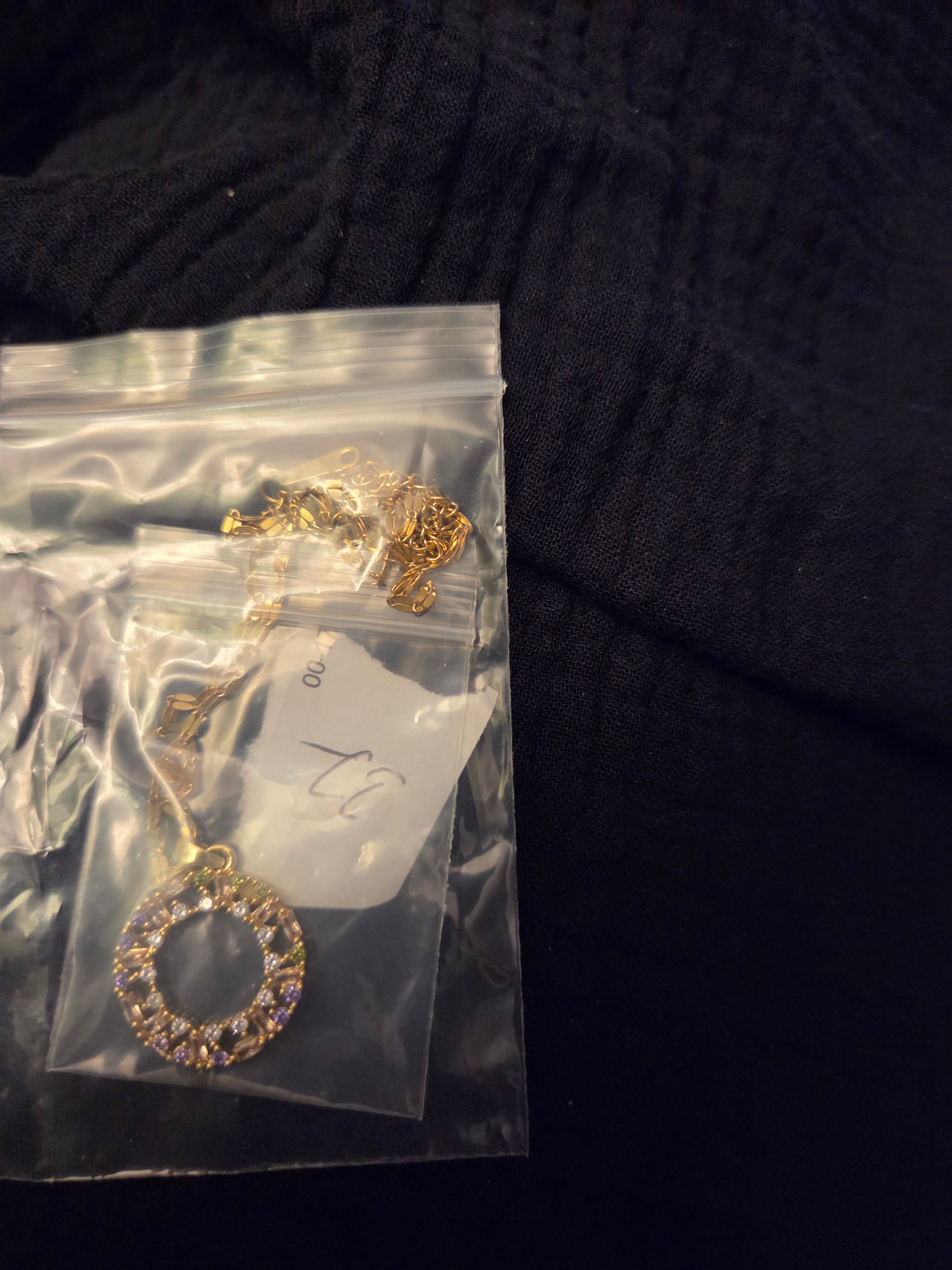 Gold necklace with colorful stones