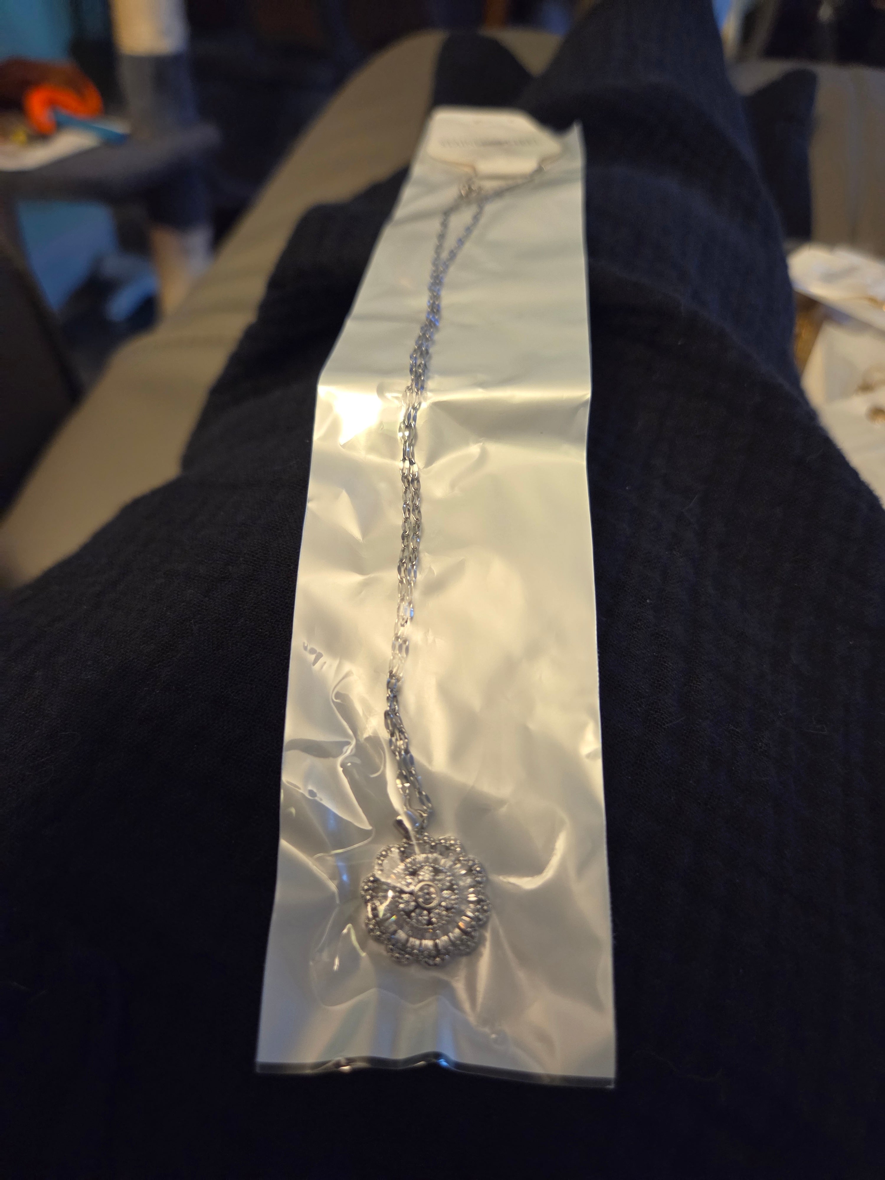 Silver round with stones necklace